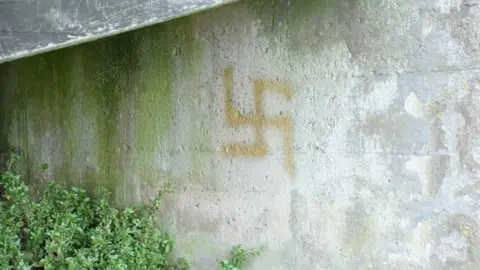 States of Jersey police Swastika graffiti