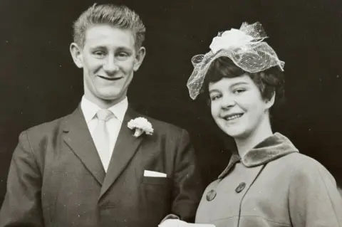 Judith Gates Black and white picture of a young couple on their wedding day