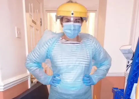 Old Vicarage Home manager Bethan Mascarenhas in full PPE