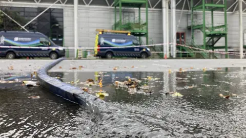 BBC Pooled water outside the Link Centre building