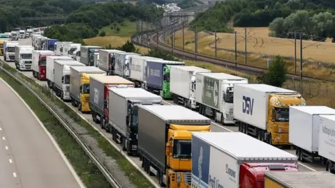 PA Media Lorries parked on the M20 near Charing, Kent, as part of Operation Stack