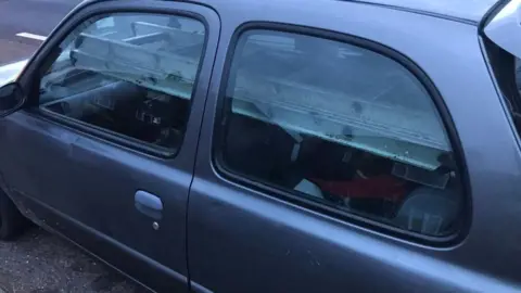 Cambs Police Ladder in car