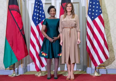 AFP US First Lady Melania Trump and the First Lady of Malawi Gertrude Maseko pose for a photograph at the State House in Lilongwe, on October 4, 2018, as she pays a one day visit to the country as part of her solo tour of Africa promoting her children's welfare programme.