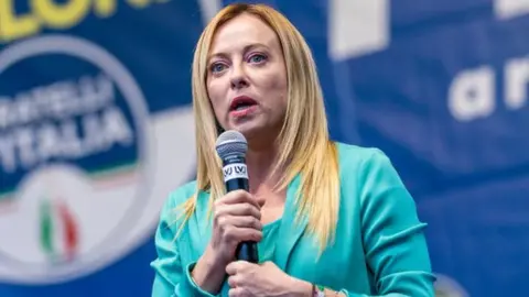 Giorgia Meloni of Fratelli d'Italia political party, member of right-wing coalition speaks to supporters in turin, Italy.