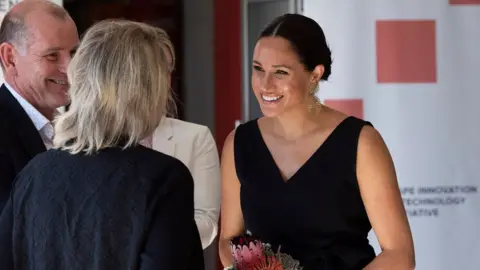 AFP The Duchess of Sussex meeting female entrepreneurs in Cape Town