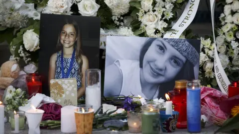 Getty Images A Toronto vigil for the victims of the Danforth shooting