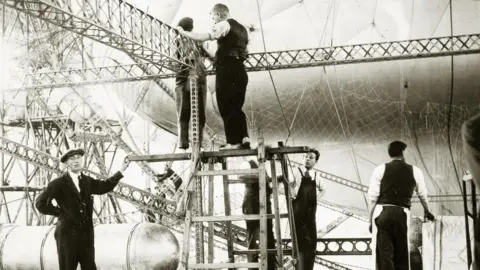 The National Archives Men building Airship R101