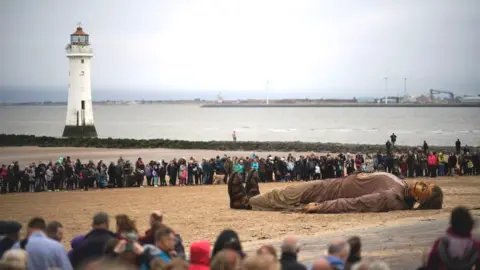 Getty Images Giant sleeping on the beach