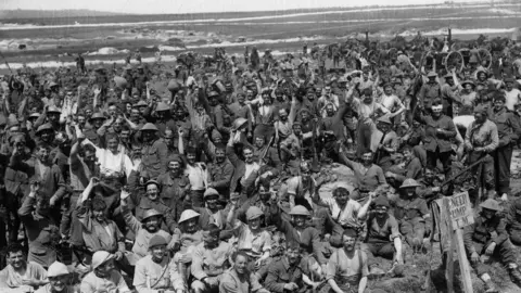 Getty Images Soldiers resting after a battle in World War One