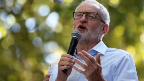 Reuters Labour party leader Jeremy Corbyn speaks during a climate change demonstration in London