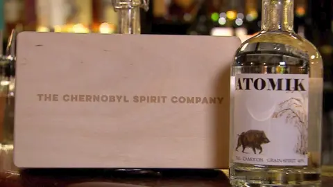 BBC The team named their grain spirit 'Atomik'