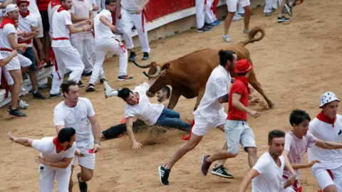 Reuters A man trampled by a bull at the San Fermín festival in Pamplona July 2018