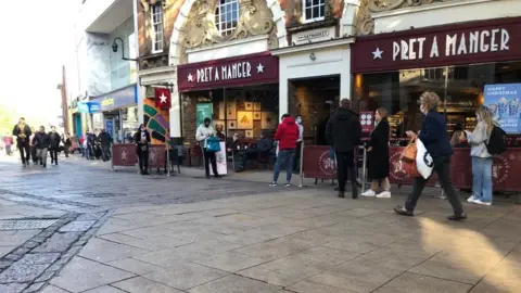 Queues formed outside Pret a Manger and Card Factory