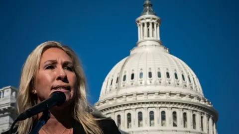 The Washington Post via Getty Images Marjorie Taylor Greene speaks during a press conference on Capitol Hill in Washington, DC