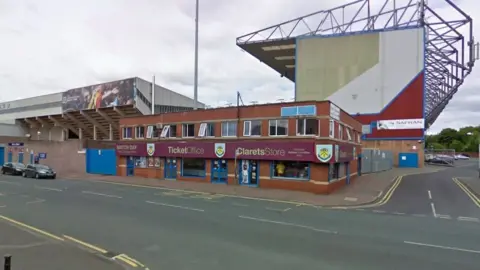 Google The junction of Harry Potts Way and Higgin Street outside Turf Moor