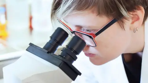 Getty Images Doctor in a lab coat