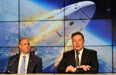 Reuters Jim Bridenstein and Elon Musk