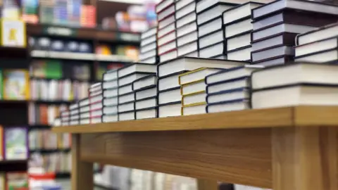 Getty Images  Stack of books at bookshop