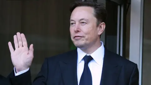 Getty Images Tesla CEO Elon Musk leaves the Phillip Burton Federal Building in San Francisco, California.