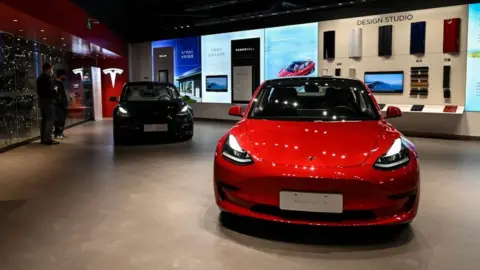 Getty Images A Tesla showroom