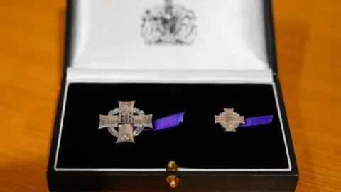 PA Media The Elizabeth Cross