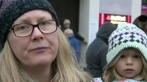 Michelle Dawson, left, and her daughter, right