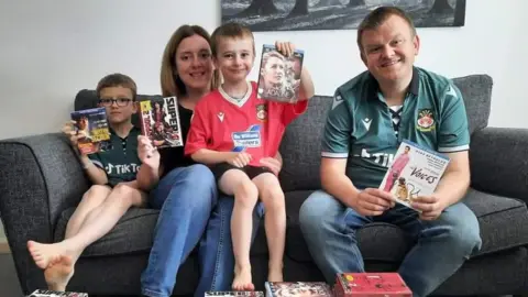 Rob Clarke Rob Clarke and his family with the DVD's