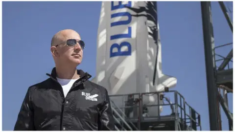 Blue Origin This April 24, 2015 handout photograph obtained courtesy of Blue Origin shows Jeff Bezos, founder of Blue Origin, at New Shepard"s West Texas launch facility before the rocket"s maiden voyage.