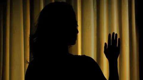 BBC Silhouetted woman