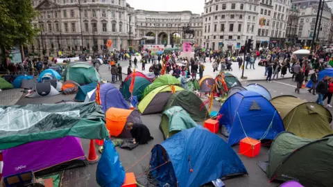 PA Media Tents belonging to protesters in Trafalgar Square