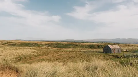 Sam Scales The abandoned corrugated building at Drigg