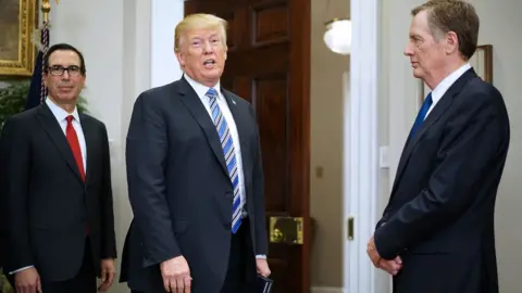 AFP/Getty US President Donald Trump answers a reporter's question after signing the Section 232 proclamations on steel and aluminum imports in the Roosevelt Room of the White House on March 8, 2018 in Washington, DC.