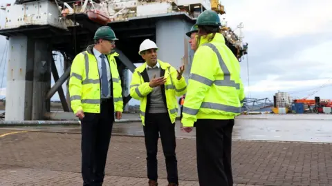 PA Media Rishi Sunak visiting Port of Cromarty Firth