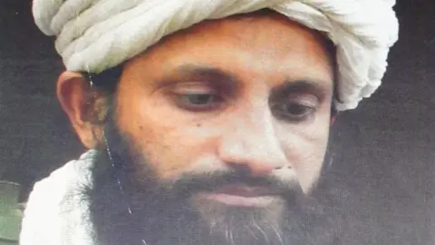 NDS Afghanistan A picture purportedly showing Asim Umar, shared by Afghanistan's National Directorate of Security