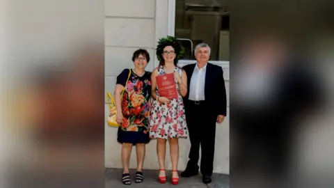 Giulia Giulia Bellan and her parents