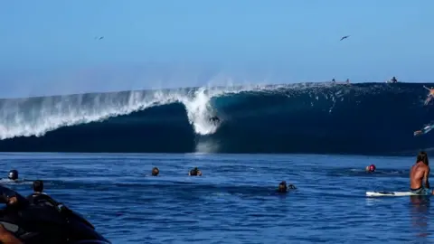 Tucker Wooding Tom Lowe at Teahupo'o