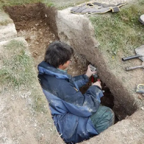 Mike Allen Soil samples being taken from the giant