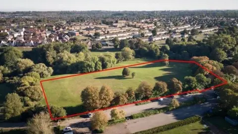 Keepmoat Ltd The land at Moredon Rec shown from the air