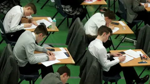 Gareth Fuller/PA Children sitting a school exam