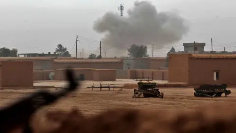 AFP Smoke rises above village south of Tal Afar (Dec 2016)