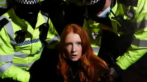 Patsy Stevenson arrested by police officers