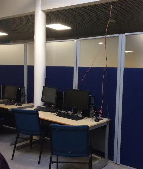 A computer suite in a corridor