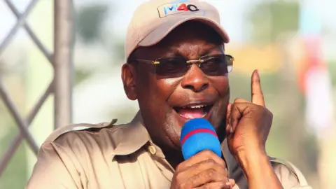 AFP Freeman Mbowe, chairman Tanzania's main opposition party Chadema, gestures during a speech at the party's first political rally in years in Mwanza - 21 January 2023