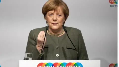 Getty Images German Chancellor Angela Merkel speaks during the Global Solutions Summit in Berlin, Germany, 19 March 2019