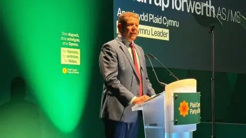BBC Rhun ap Iorwerth addressing the Plaid Cymru conference