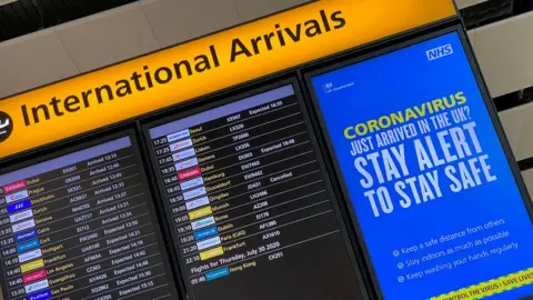 Reuters Arrivals display indicator board at London Heathrow Airport