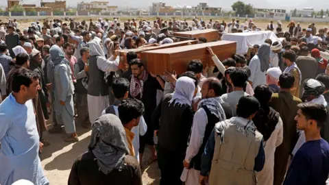 Reuters A funeral is held in Kabul