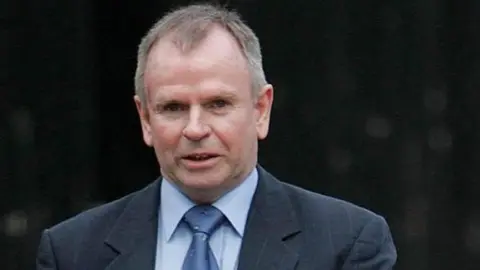 PA Media Colm Murphy leaves Dublin"s Special Criminal Court a free man after posting bail totalling 50,000 euro (£34,600). His conviction for conspiring to cause the Omagh bombing was quashed by the Appeal Court.