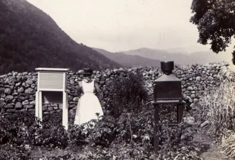 Met Office/Uni of Reading/Rainfall Rescue Observations being taken at a rain gauge in Seathwaite on 14 July 1899