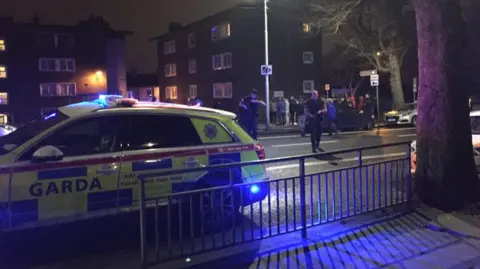 Gardaí (Irish police) at the scene of the shooting